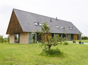 unique 16 person groupaccommodation Friesland Netherlands in an orchard