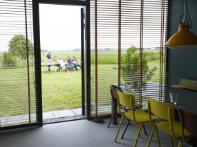 nice groupaccommodation with dining in the fields Friesland Netherlands